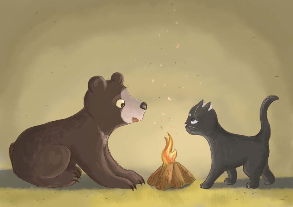 kot i niedźwiadek patrzą na siebie zaskoczone, pomiędzy nimi płonie małe ognisko