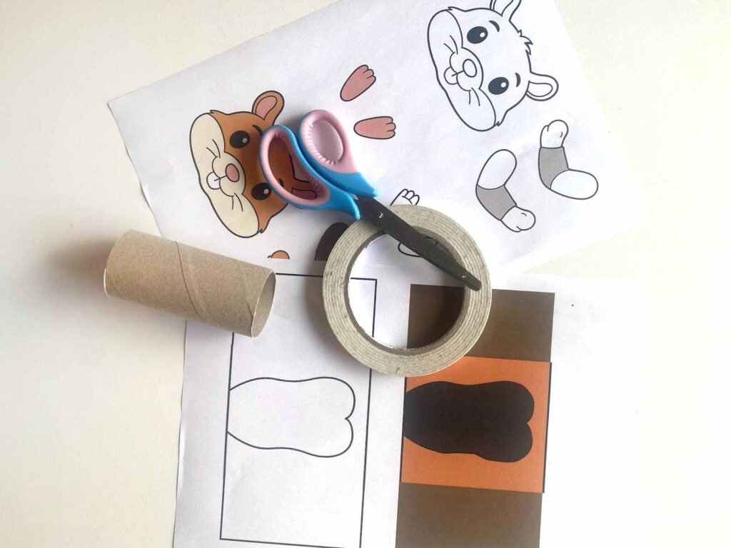 Chomik z papierowej rolki materialy rzeczy niezbędne do realizacji zadania: szablony, taśma klejąca,rolka papierowa, nożyczki